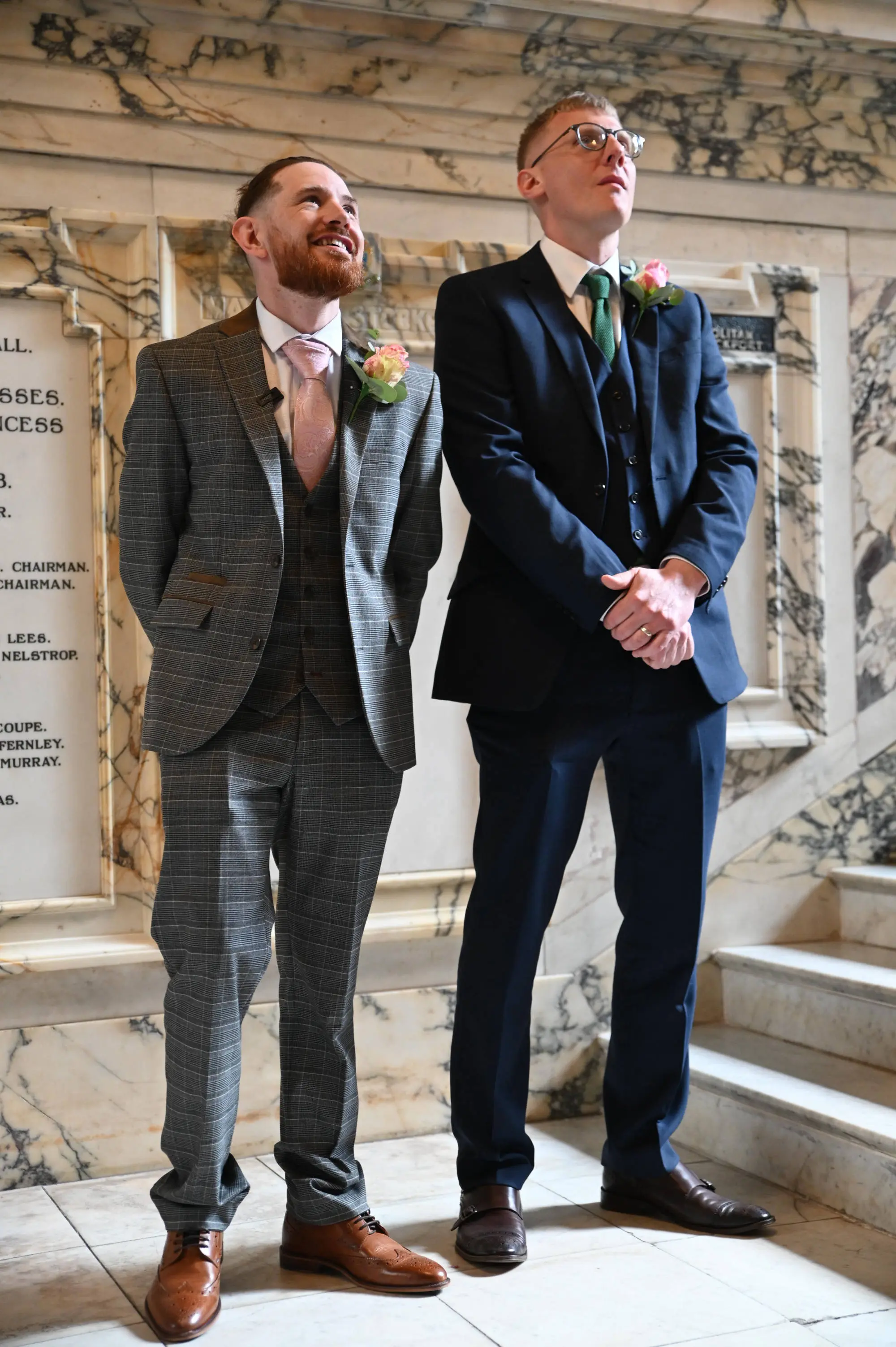 groom and his bestman seeing the bride for the first time r the first time